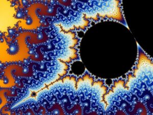 Fractal art geometry with black center and orange, yellow and blue waves emanating from center.